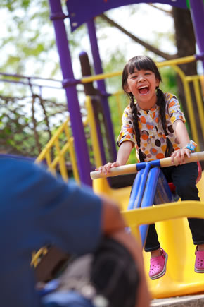 Little girl in play structure